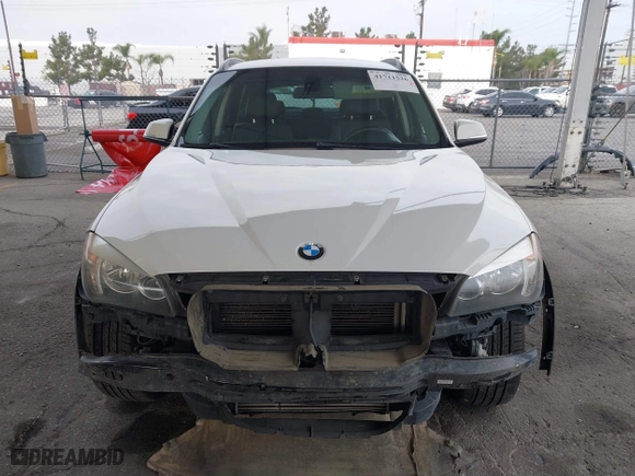 2015 BMW X1 sDrive28i with VIN WBAVM1C53FV318663, listed as a IAAI auction lot 41711526 with 182,204 mi miles. Bid and sale history available at carsss.com. Image 12.
