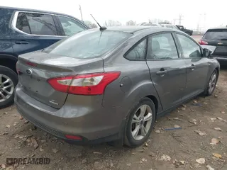 2014 Ford Focus SE with VIN 1FADP3F25EL296152, listed as a IAAI auction lot 40692477 with 197,566 mi miles. Bid and sale history available at carsss.com. Image 4.