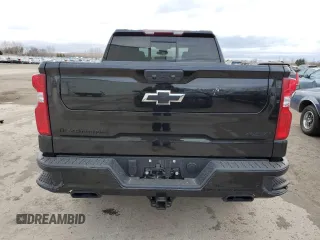 2025 Chevrolet Silverado 1500 with VIN 1GCUKEE86SZ159322, listed as a Copart auction lot 52690435 with 4,975 mi miles and Salvage Title. Bid and sale history available at DreamBid. Image 6.