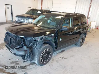 2021 Ford Bronco Sport Outer Banks z VIN 3FMCR9C60MRA80148, wystawiony jako IAAI lot #42284516 z przebiegiem 25 699 mil mil oraz . Historia ofert i sprzedaży dostępna na DreamBid. Obrazek 2.