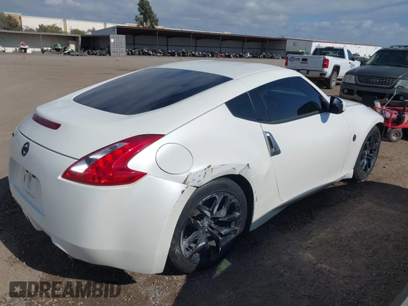2016 Nissan 370Z Sport z VIN JN1AZ4EH9GM931683, wystawiony jako IAAI lot #42000779 z przebiegiem 113 919 mil mil oraz . Historia ofert i sprzedaży dostępna na DreamBid. Obrazek 4.