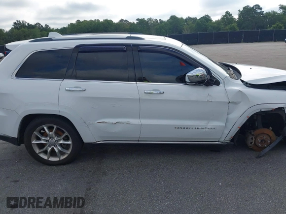 2014 Jeep Grand Cherokee Summit with VIN 1C4RJFJT2EC501235, listed as a IAAI auction lot 42622790 with 160,000 mi miles and . Bid and sale history available at DreamBid. Image 14.