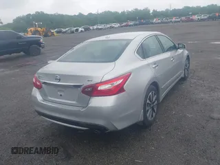 2017 Nissan Altima SV with VIN 1N4AL3AP4HC148936, listed as a IAAI auction lot 42340153 with 76,049 mi miles and . Bid and sale history available at DreamBid. Image 4.
