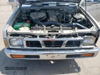 1996 Nissan Frontier XE with VIN 1N6SD16S6TC332584, listed as a Copart auction lot 58305425 with 75,590 mi miles and Salvage title. Bid and sale history available at DreamBid. Image 11.