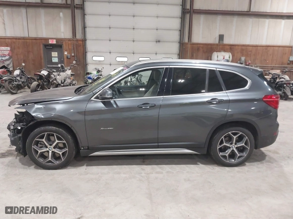 2016 BMW X1 xDrive28i with VIN WBXHT3C3XG5E47536, listed as a IAAI auction lot 41672144 with 97,932 mi miles. Bid and sale history available at carsss.com. Image 14.