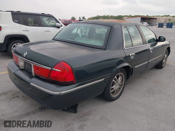 2002 Mercury Grand Marquis LS Premium z VIN 2MEFM75WX2X626520, wystawiony jako IAAI lot #42374203 z przebiegiem 139 692 mil mil oraz . Historia ofert i sprzedaży dostępna na DreamBid. Obrazek 4.