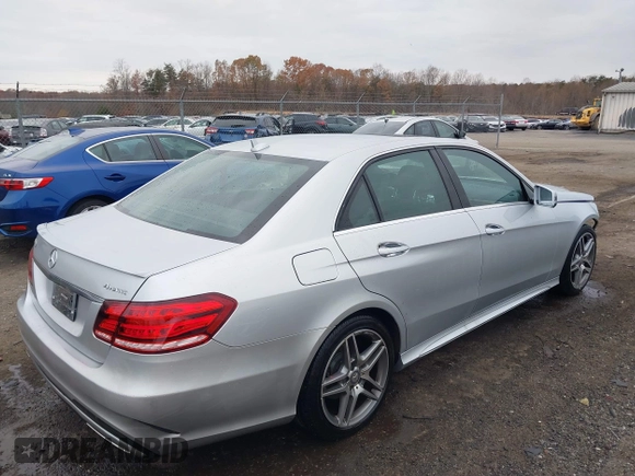 2014 Mercedes-Benz E 350 Luxury with VIN WDDHF8JB0EB075945, listed as a IAAI auction lot 41018546 with 66,678 mi miles and . Bid and sale history available at DreamBid. Image 4.