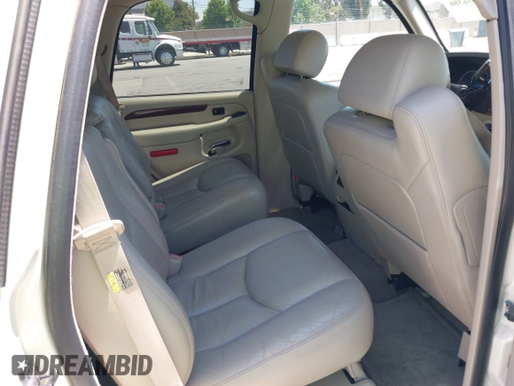 2004 Cadillac Escalade with VIN 1GYEK63N54R122875, listed as a IAAI auction lot 42736386 with 143,422 mi miles and . Bid and sale history available at DreamBid. Image 8.