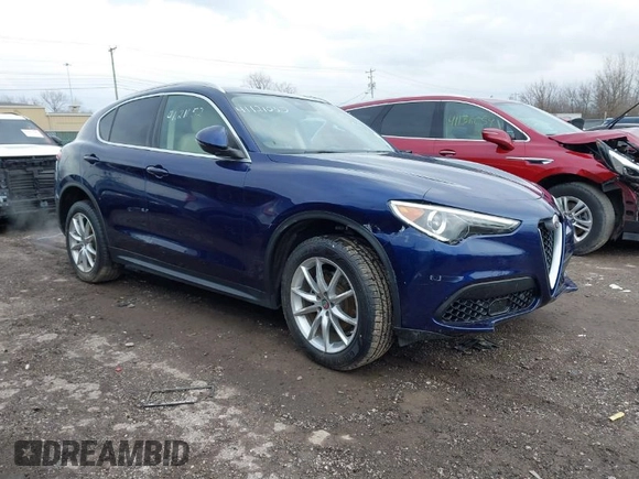 2019 Alfa Romeo Stelvio Ti z VIN ZASPAKBN4K7C43201, wystawiony jako IAAI lot #41121052 z przebiegiem 32 768 mil mil oraz . Historia ofert i sprzedaży dostępna na DreamBid. Obrazek 1.