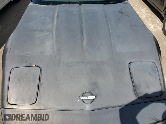 1988 Chevrolet Corvette z VIN 1G1YY2182J5119855, wystawiony jako Copart lot #73824664 z przebiegiem Nie podano mil oraz Szkoda całkowita • Salvage title. Historia ofert i sprzedaży dostępna na DreamBid. Obrazek 11.