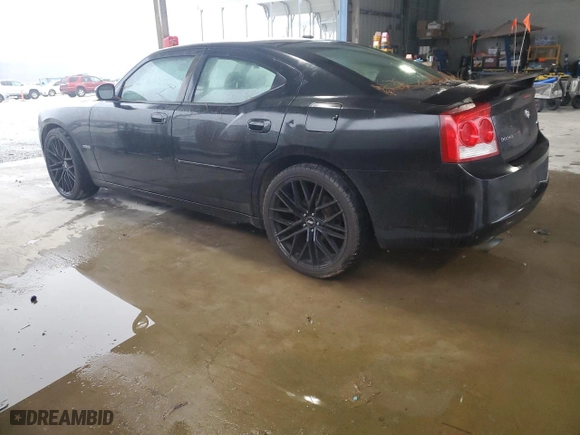 2010 Dodge Charger R/T with VIN 2B3CA5CT9AH156470, listed as a Copart auction lot 87279304 with 206,789 mi miles and Salvage Title. Bid and sale history available at carsss.com. Image 2.