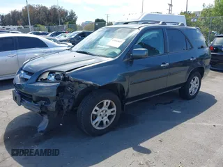 2004 Acura MDX Touring Pkg w/Navigation with VIN 2HNYD18834H517618, listed as a IAAI auction lot 42003807 with 186,555 mi miles. Bid and sale history available at carsss.com. Image 17.