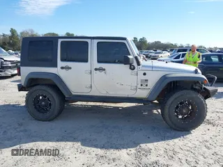 2007 Jeep Wrangler Unlimited X with VIN 1J4GB39147L199367, listed as a IAAI auction lot 40897772 with 229,309 mi miles and . Bid and sale history available at DreamBid. Image 13.