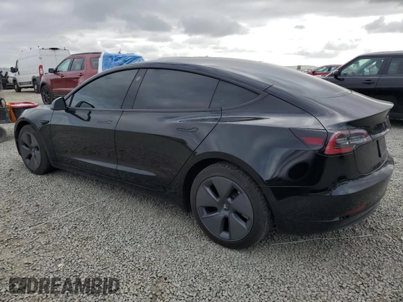 2022 Tesla Model 3 Long Range with VIN 5YJ3E1EB6NF334914, listed as a Copart auction lot 53876415 with 52,875 mi miles and Salvage Title. Bid and sale history available at carsss.com. Image 2.