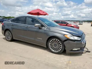 2017 Ford Fusion Hybrid Titanium with VIN 3FA6P0RU1HR368930, listed as a Copart auction lot 64965075 with 180,607 mi miles and Clean title. Bid and sale history available at DreamBid. Image 4.