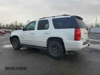 2012 GMC Yukon SLT with VIN 1GKS2DE00CR284687, listed as a Copart auction lot 46754465 with 123,346 mi miles and Salvage Title. Bid and sale history available at carsss.com. Image 2.