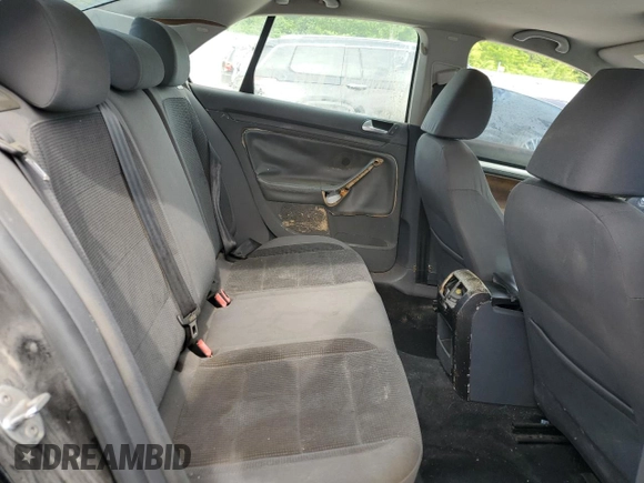 2009 Volkswagen Jetta S z VIN 3VWJM71K39M165677, wystawiony jako Copart lot #56901665 z przebiegiem 202 632 mil mil oraz Czysty tytuł • Clean title. Historia ofert i sprzedaży dostępna na DreamBid. Obrazek 10.