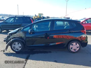 2019 Honda Fit LX with VIN 3HGGK5H46KM735161, listed as a IAAI auction lot 41338424 with 59,260 mi miles. Bid and sale history available at carsss.com. Image 15.