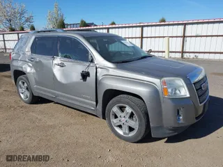 2012 GMC Terrain SLT-2 with VIN 2GKFLXE59C6351701, listed as a IAAI auction lot 42078590 with 124,841 mi miles. Bid and sale history available at carsss.com. Image 1.