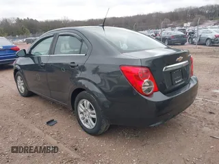 2014 Chevrolet Sonic LT with VIN 1G1JC5SH1E4236385, listed as a IAAI auction lot 42066948 with 126,200 mi miles and . Bid and sale history available at DreamBid. Image 3.