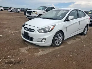 2012 Hyundai Accent GLS with VIN KMHCU4AEXCU069242, listed as a Copart auction lot 61475315 with 136,591 mi miles and Salvage title. Bid and sale history available at DreamBid. Image 1.