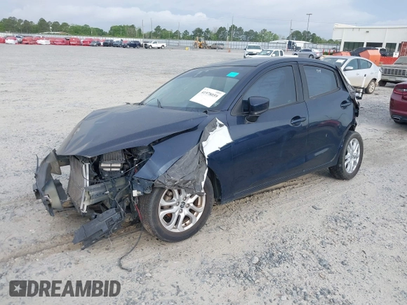 2016 Scion iA with VIN 3MYDLBZV1GY129384, listed as a IAAI auction lot 41978059 with 166,182 mi miles. Bid and sale history available at carsss.com. Image 2.