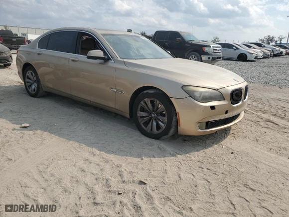 2011 BMW 7 Series 740Li with VIN WBAKB4C52BC574535, listed as a Copart auction lot 45248435 with 0 mi miles and Salvage Title. Bid and sale history available at carsss.com. Image 4.