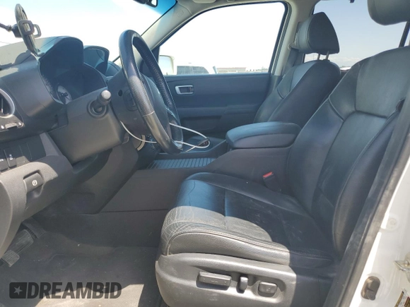 2014 Honda Pilot Touring z VIN 5FNYF4H9XEB047993, wystawiony jako Copart lot #57518705 z przebiegiem 159 809 mil mil oraz Szkoda całkowita • Salvage title. Historia ofert i sprzedaży dostępna na DreamBid. Obrazek 7.