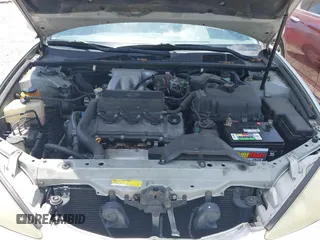 2002 Toyota Camry XLE z VIN 4T1BF32K42U531992, wystawiony jako IAAI lot #42294926 z przebiegiem 294 929 mil mil oraz . Historia ofert i sprzedaży dostępna na DreamBid. Obrazek 10.