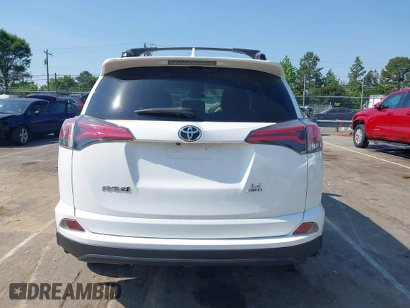 2017 Toyota RAV4 LE with VIN JTMBFREV8HJ157555, listed as a IAAI auction lot 42147300 with 81,187 mi miles and . Bid and sale history available at DreamBid. Image 16.
