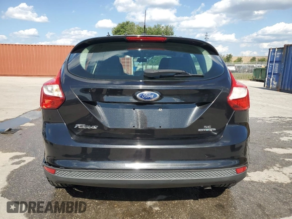 2012 Ford Focus SE z VIN 1FAHP3K28CL420113, wystawiony jako Copart lot #56986925 z przebiegiem 87 381 mil mil oraz Szkoda całkowita • Salvage title. Historia ofert i sprzedaży dostępna na DreamBid. Obrazek 6.