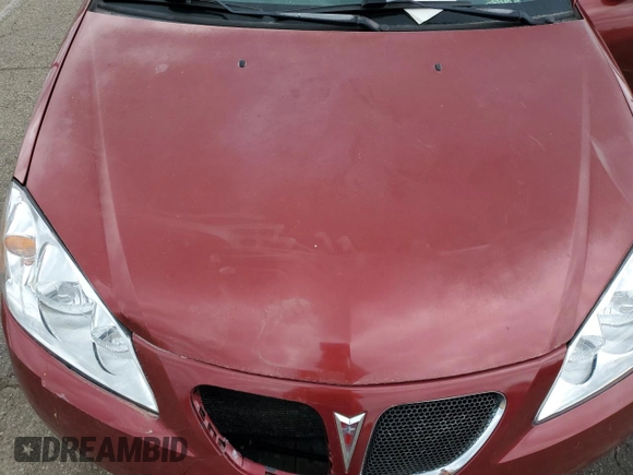 2008 Pontiac G6 z VIN 1G2ZG57B884225041, wystawiony jako Copart lot #57788735 z przebiegiem 112 964 mil mil oraz Szkody całkowita. Historia ofert i sprzedaży dostępna na DreamBid. Obrazek 11.