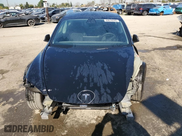 2025 Tesla Model 3 Long Range with VIN 5YJ3E1EA0SF902836, listed as a Copart auction lot 49674245 with 3,302 mi miles and Salvage Title. Bid and sale history available at DreamBid. Image 5.