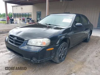 2001 Nissan Maxima SE z VIN JN1CA31D71T834010, wystawiony jako IAAI lot #42317556 z przebiegiem 193 494 mil mil oraz . Historia ofert i sprzedaży dostępna na DreamBid. Obrazek 2.