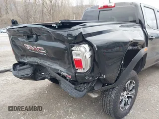 2023 GMC Canyon 4WD AT4 with VIN 1GTP6DEK9P1151776, listed as a IAAI auction lot 41655533 with 11,750 mi miles. Bid and sale history available at carsss.com. Image 6.