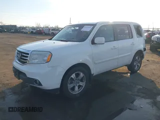2014 Honda Pilot EX-L with VIN 5FNYF3H57EB025702, listed as a IAAI auction lot 41242826 with 190,503 mi miles. Bid and sale history available at carsss.com. Image 2.