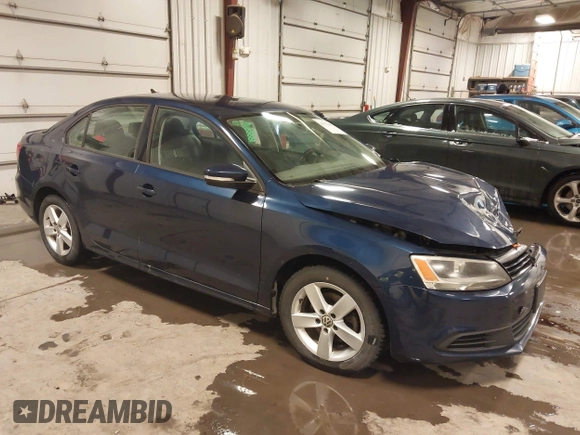 2012 Volkswagen Jetta Sedan TDI with VIN 3VW3L7AJ8CM378733, listed as a IAAI auction lot 41571197 with 151,159 mi miles. Bid and sale history available at carsss.com. Image 1.