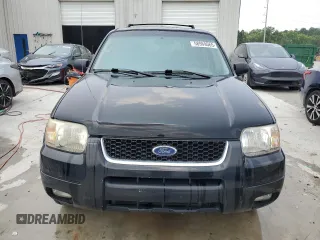 2004 Ford Escape Limited with VIN 1FMCU04164KB51256, listed as a Copart auction lot 58969565 with 137,360 mi miles and Salvage title. Bid and sale history available at DreamBid. Image 5.