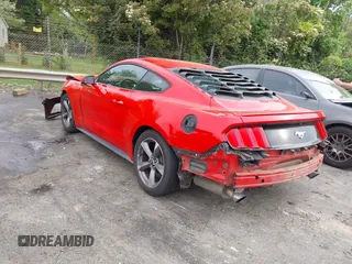 2015 Ford Mustang EcoBoost with VIN 1FA6P8TH7F5411127, listed as a IAAI auction lot 42041294 with 144,067 mi miles and . Bid and sale history available at carsss.com. Image 3.