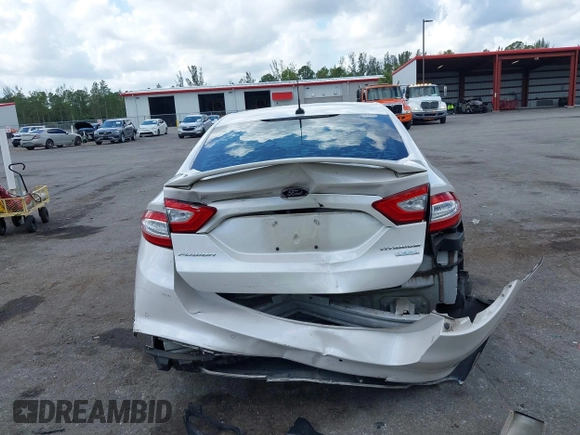 2016 Ford Fusion Titanium with VIN 3FA6P0K96GR400436, listed as a IAAI auction lot 42191256 with 128,447 mi miles and . Bid and sale history available at DreamBid. Image 6.