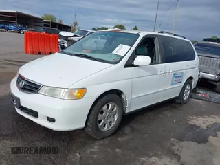 2004 Honda Odyssey EX-L with VIN 5FNRL18074B109717, listed as a IAAI auction lot 37731273 with 314,449 mi miles and . Bid and sale history available at DreamBid. Image 17.