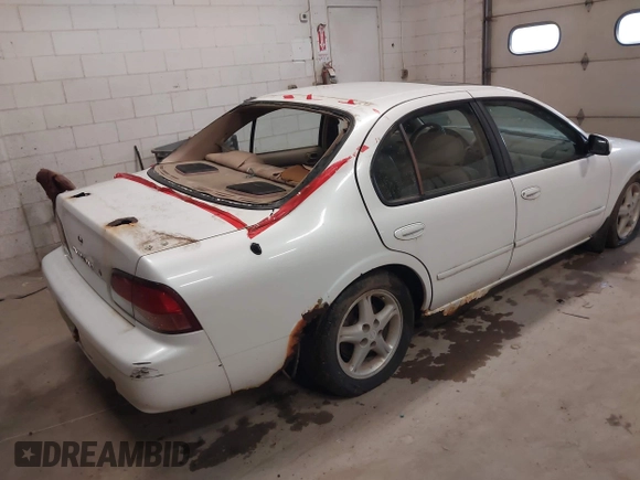 1998 Nissan Maxima GXE z VIN JN1CA21A9WM805626, wystawiony jako IAAI lot #42497316 z przebiegiem 195 991 mil mil oraz . Historia ofert i sprzedaży dostępna na DreamBid. Obrazek 4.