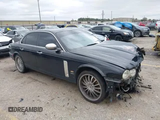 2007 Jaguar XJ with VIN SAJXA73C97TH14362, listed as a IAAI auction lot 41305716 with 120,924 mi miles and . Bid and sale history available at DreamBid. Image 1.