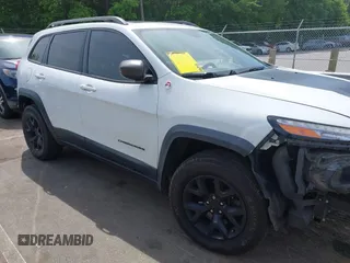 2016 Jeep Cherokee Trailhawk с VIN 1C4PJMBS7GW109189, выставлен на аукционе IAAI как лот 42219470 с пробегом 115 197 миль миль и . История ставок и продаж доступна на DreamBid. Изображение 1.