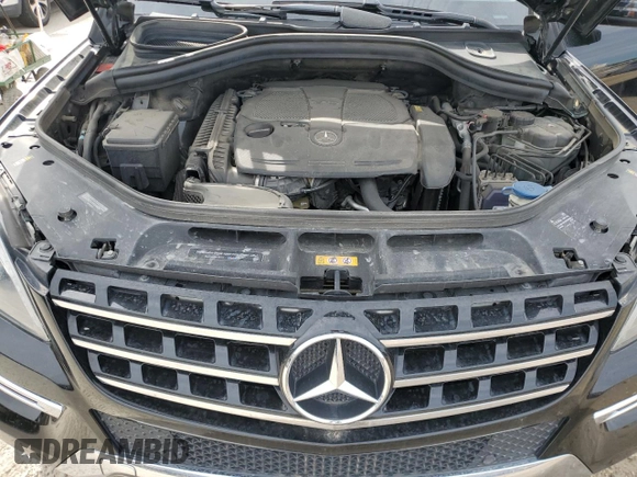 2014 Mercedes-Benz M 350 with VIN 4JGDA5HB2EA330804, listed as a Copart auction lot 52989925 with 127,003 mi miles and Salvage title. Bid and sale history available at DreamBid. Image 12.