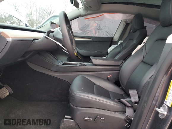 2023 Tesla Model Y Long Range with VIN 7SAYGDEE6PF752570, listed as a Copart auction lot 84927794 with 52,297 mi miles and Salvage Title. Bid and sale history available at DreamBid. Image 7.