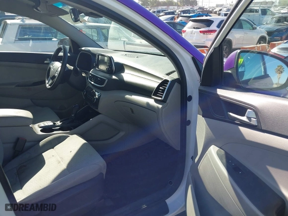2019 Hyundai Tucson Value with VIN KM8J33A43KU067973, listed as a IAAI auction lot 40122626 with 107,358 mi miles. Bid and sale history available at carsss.com. Image 5.