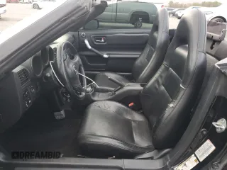 2003 Toyota MR2 z VIN JTDFR320930065139, wystawiony jako Copart lot #55174975 z przebiegiem 122 156 mil mil oraz Szkody całkowita. Historia ofert i sprzedaży dostępna na DreamBid. Obrazek 7.