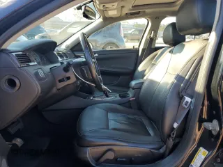 2014 Chevrolet Impala LTZ with VIN 2G1WC5E34E1121605, listed as a Copart auction lot 82705244 with 174,886 mi miles and Salvage Title. Bid and sale history available at DreamBid. Image 7.