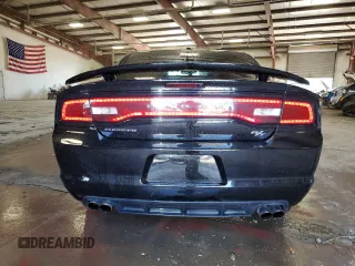 2014 Dodge Charger RT with VIN 2C3CDXDT4EH124147, listed as a Copart auction lot 65571904 with 121,538 mi miles and Salvage Title. Bid and sale history available at carsss.com. Image 6.